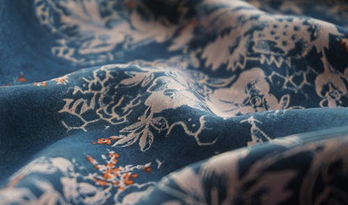 Close Up Photo of Blue Fabric