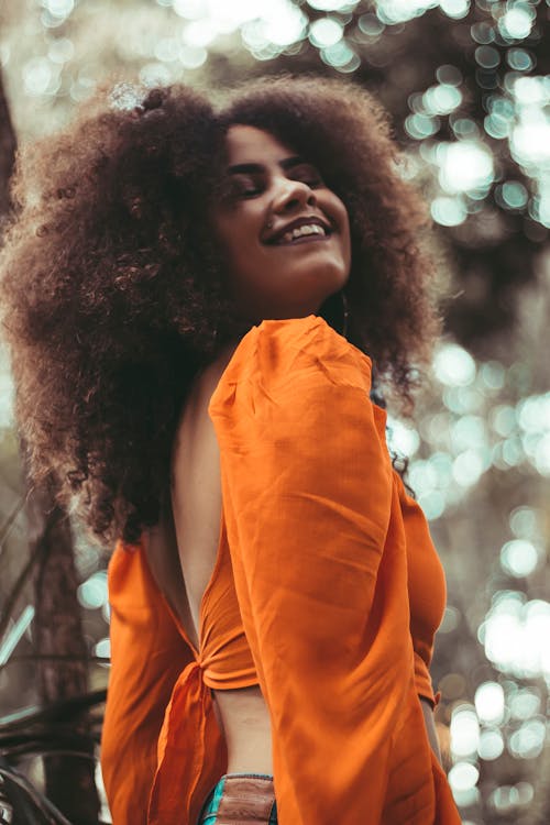 Free Woman Wearing Orange Top Stock Photo