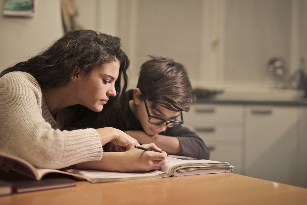 Student receiving individual support while studying at home
