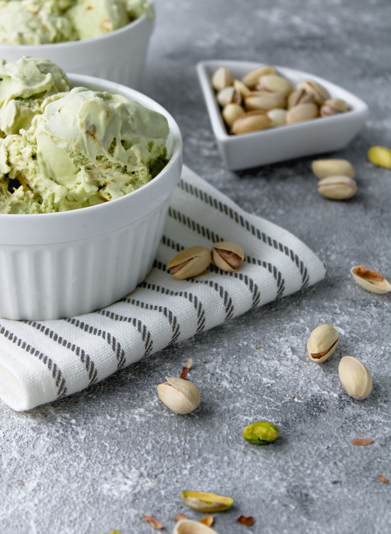 Pistachio gelato scoops with crushed pistachios