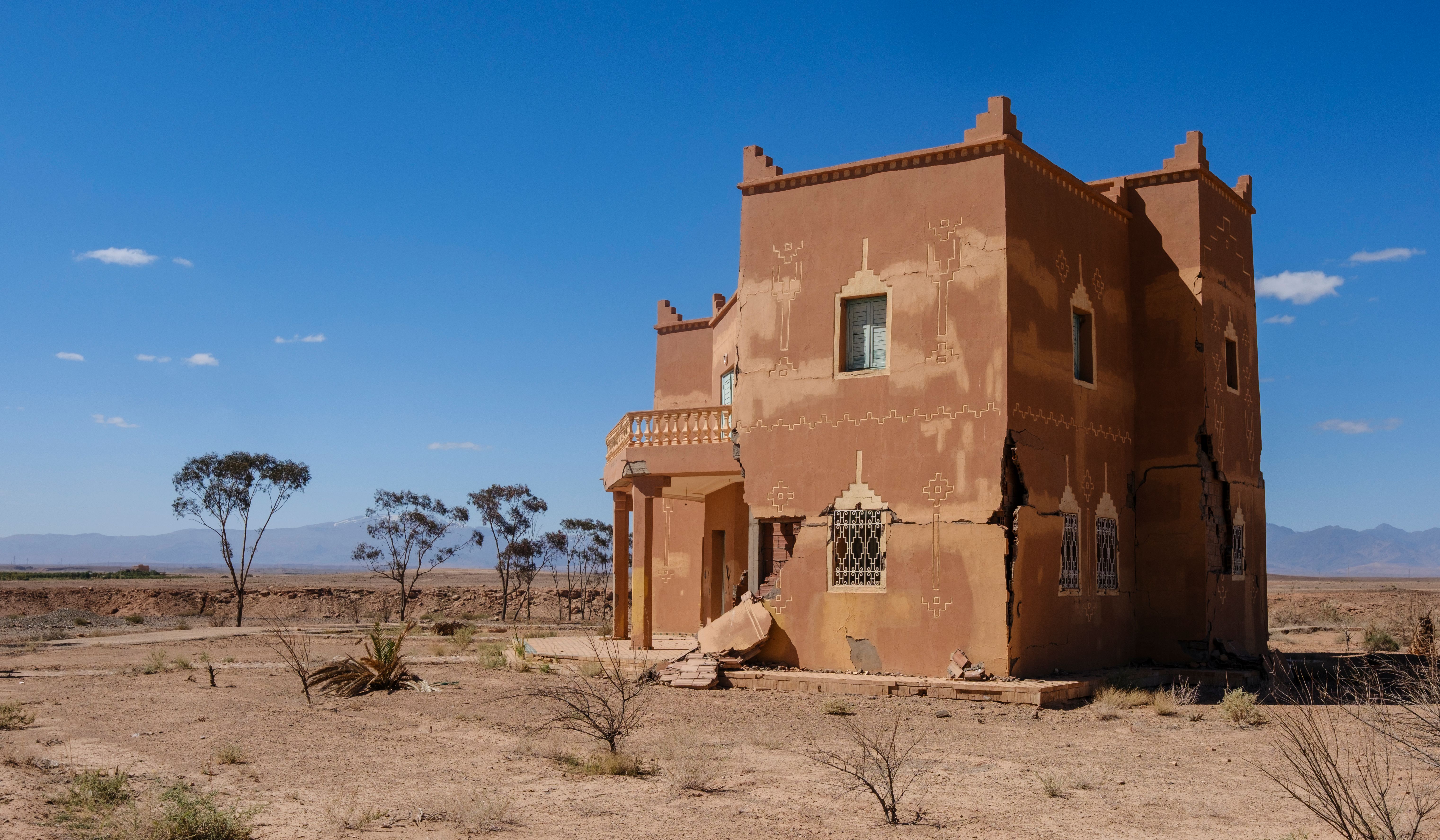 Vintage desert house with traditional Moroccan architecture near Ouarzazate Lake City, Morocco.