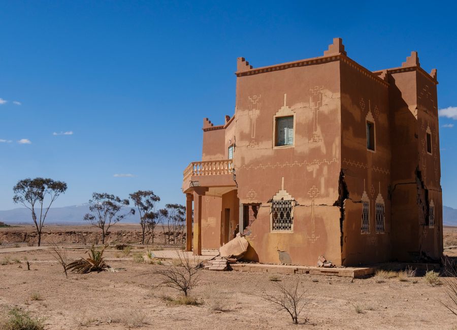 Vintage desert house with traditional Moroccan architecture near Ouarzazate Lake City, Morocco.