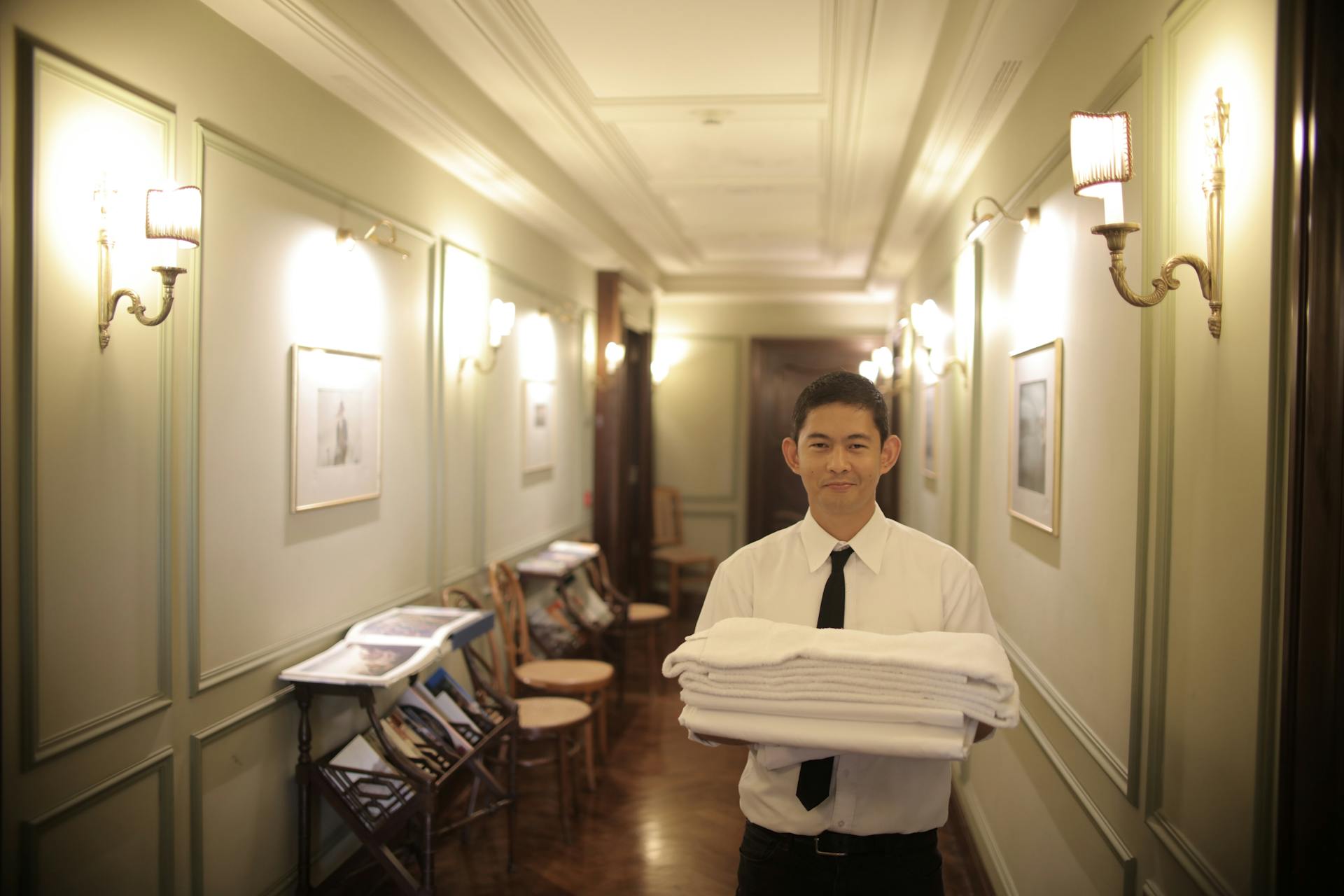 Man Holding White Linen Ad White Towel