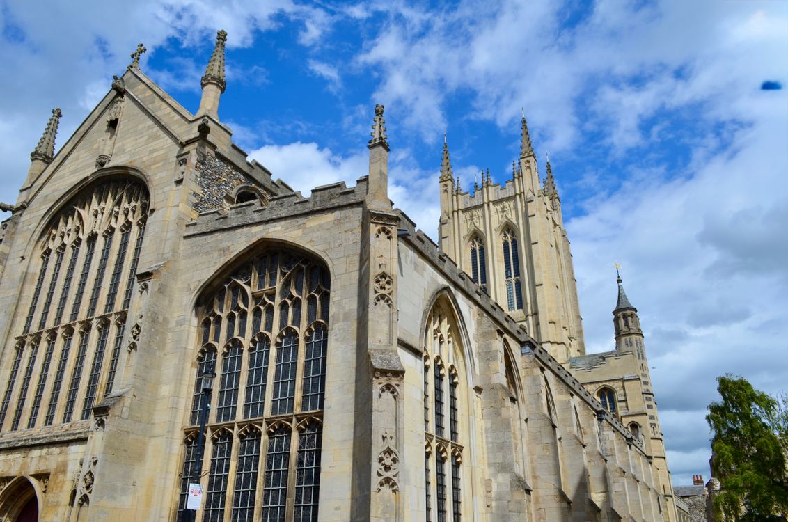 Gothic Cathedral Against a Vibrant Blue Sky · Free Stock Photo