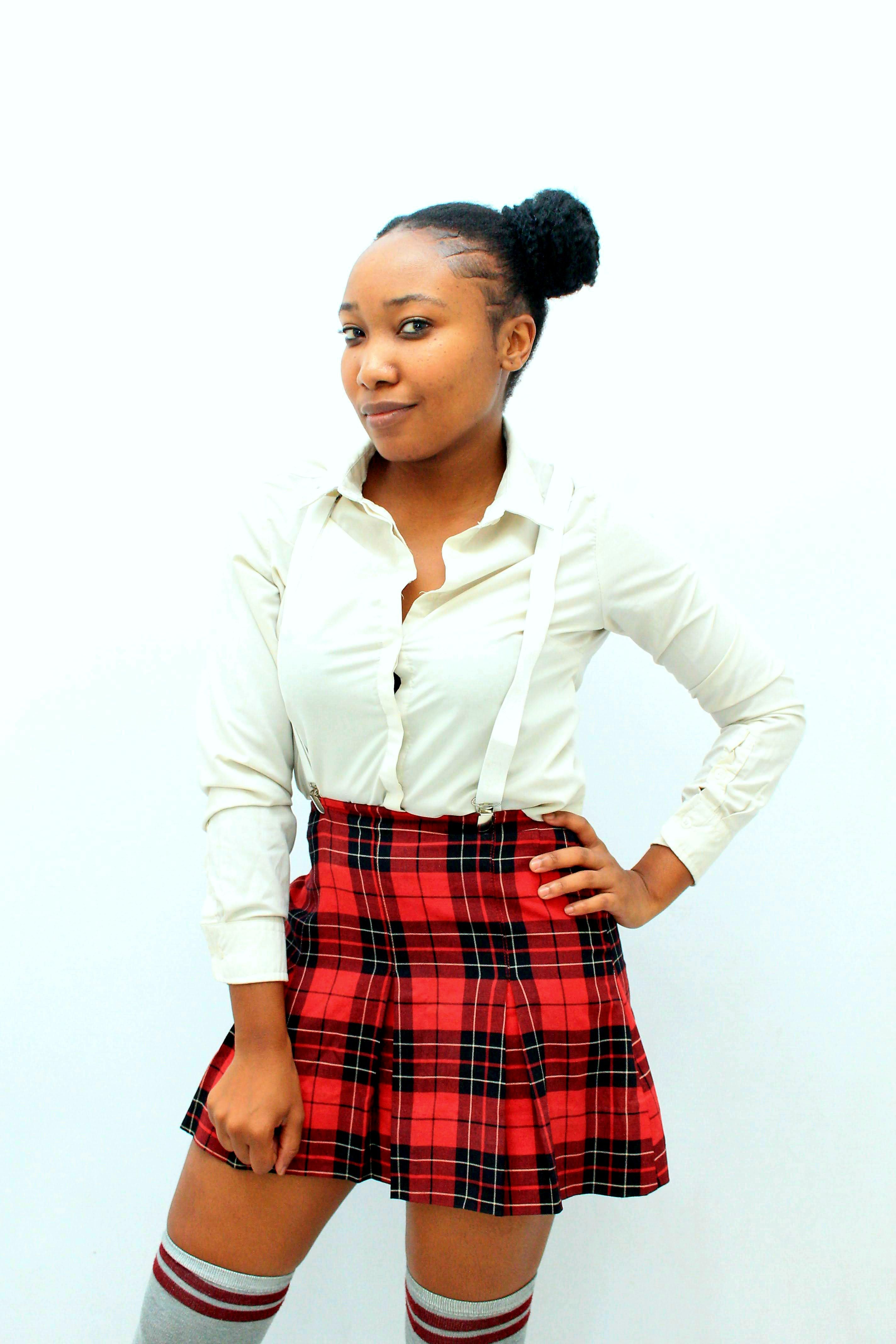 Fall tartan plaid outfit: classic red tartan mini skirt styled with a crisp white shirt