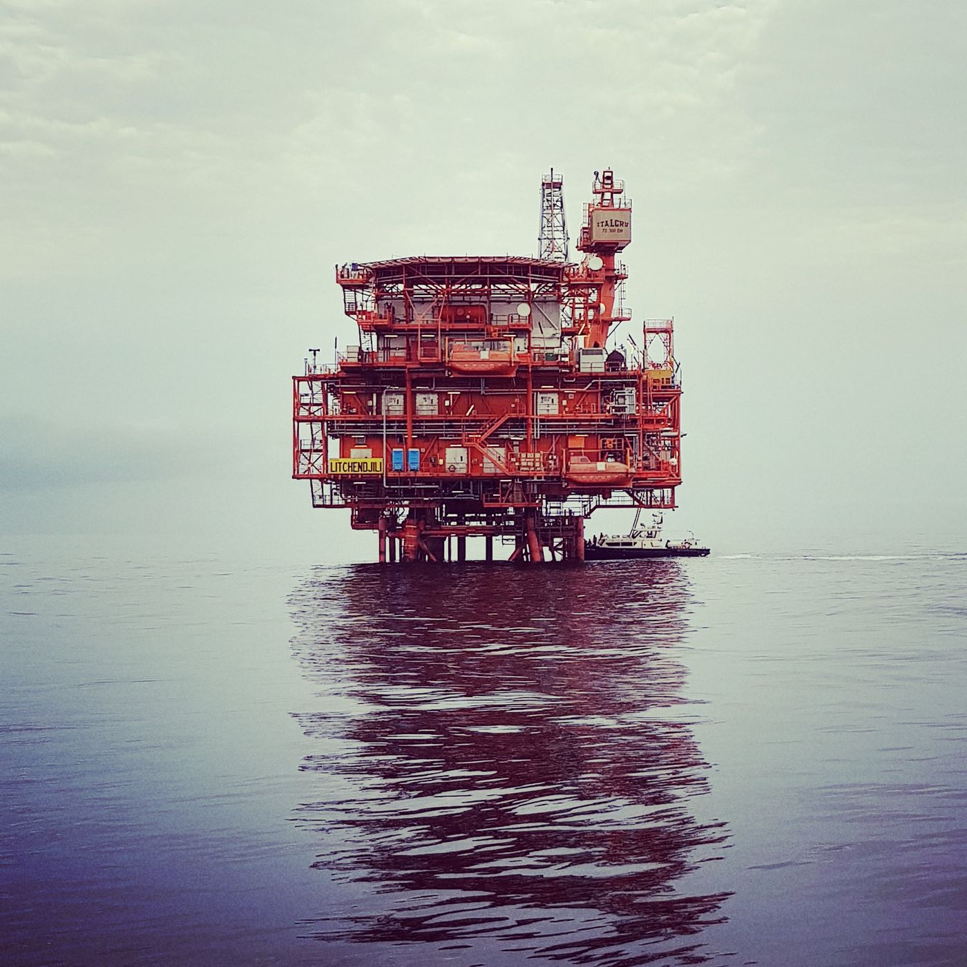 Offshore oil rig in calm ocean waters