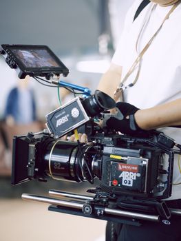 Close-up of a professional filmmaking camera setup during a shoot.