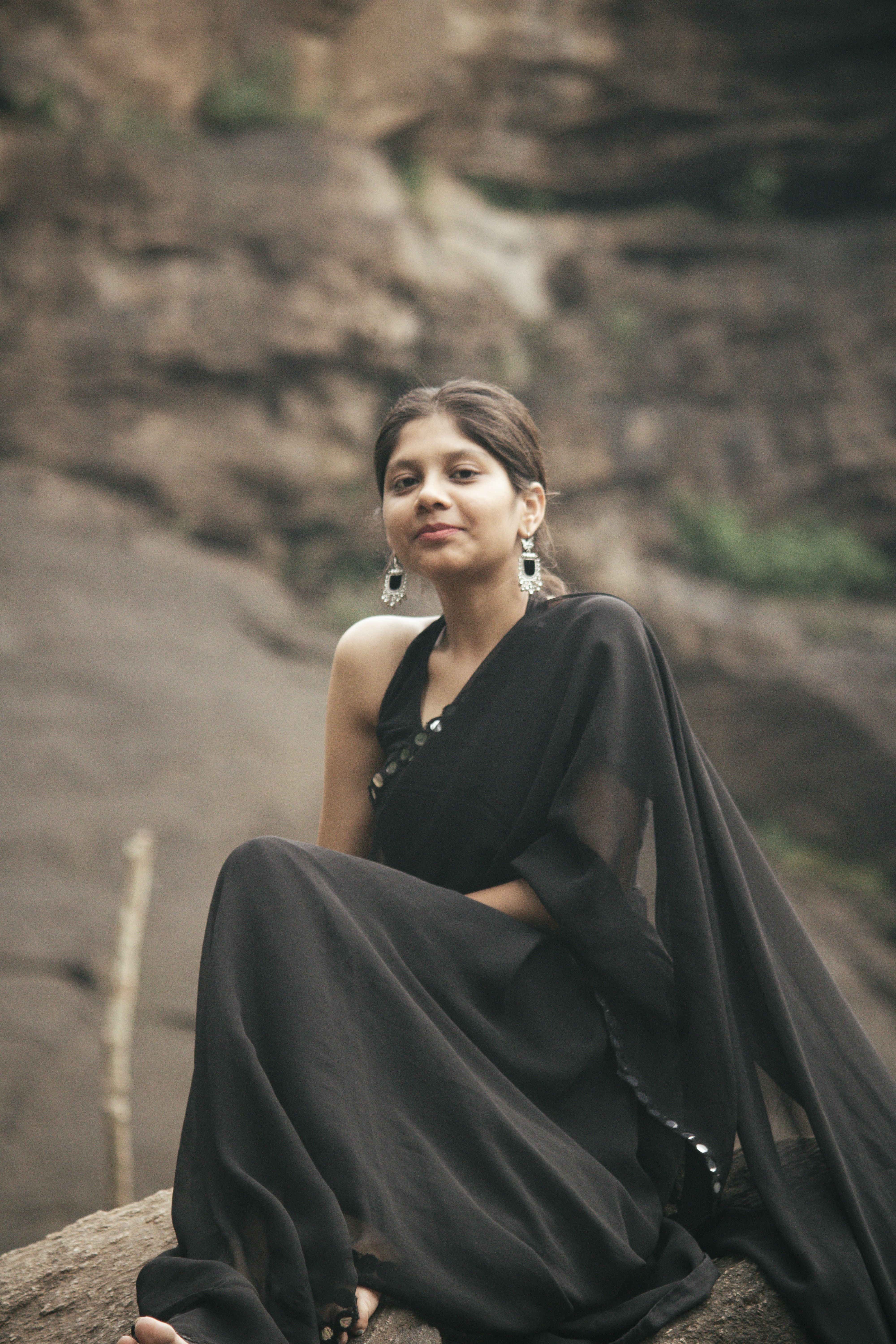 Young Woman Posing in Black Saree Outdoors · Free Stock Photo