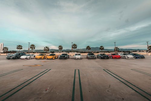 Free Luxury Cars Parked on Parking Area Stock Photo