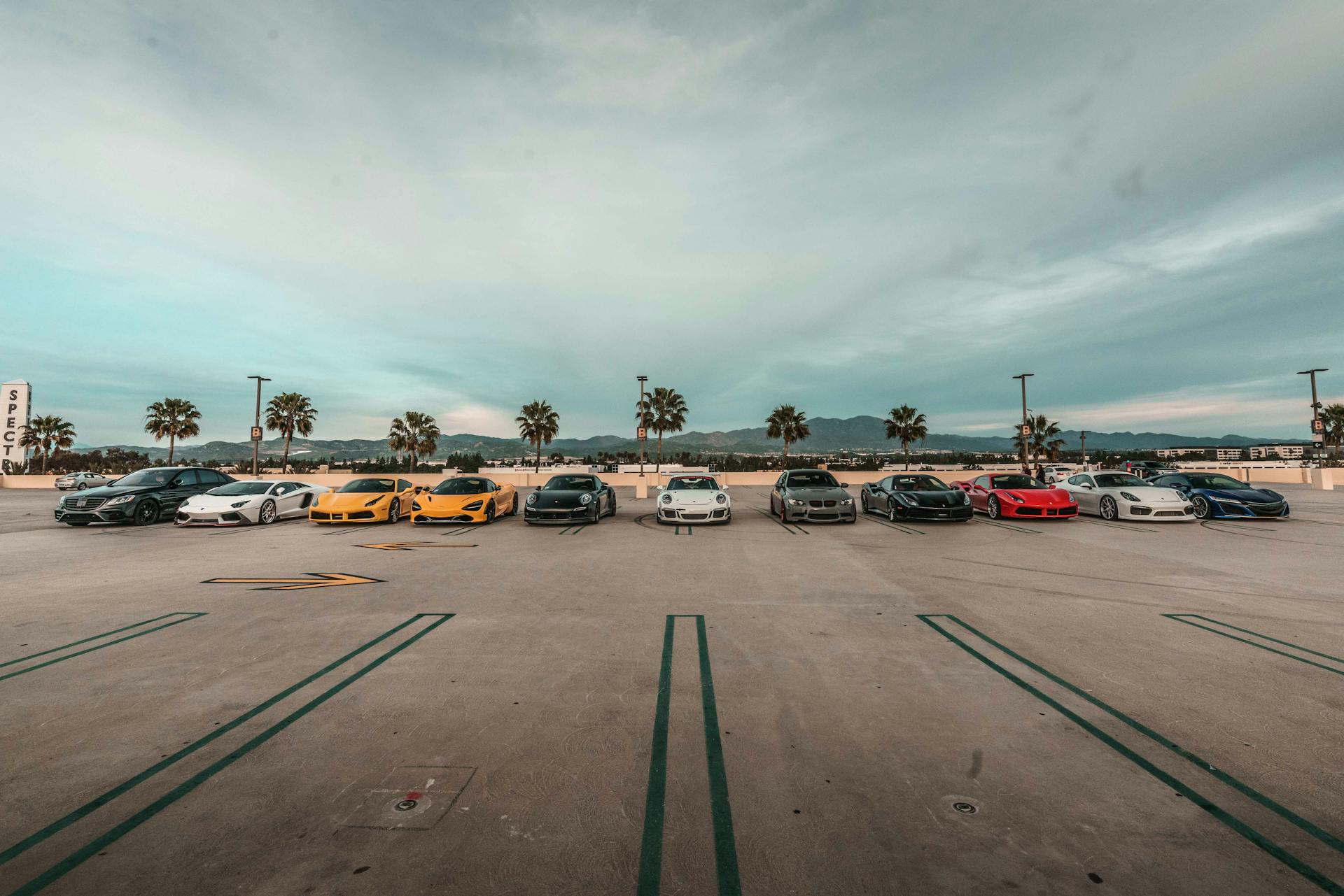 Luxury Cars Parked on Parking Area