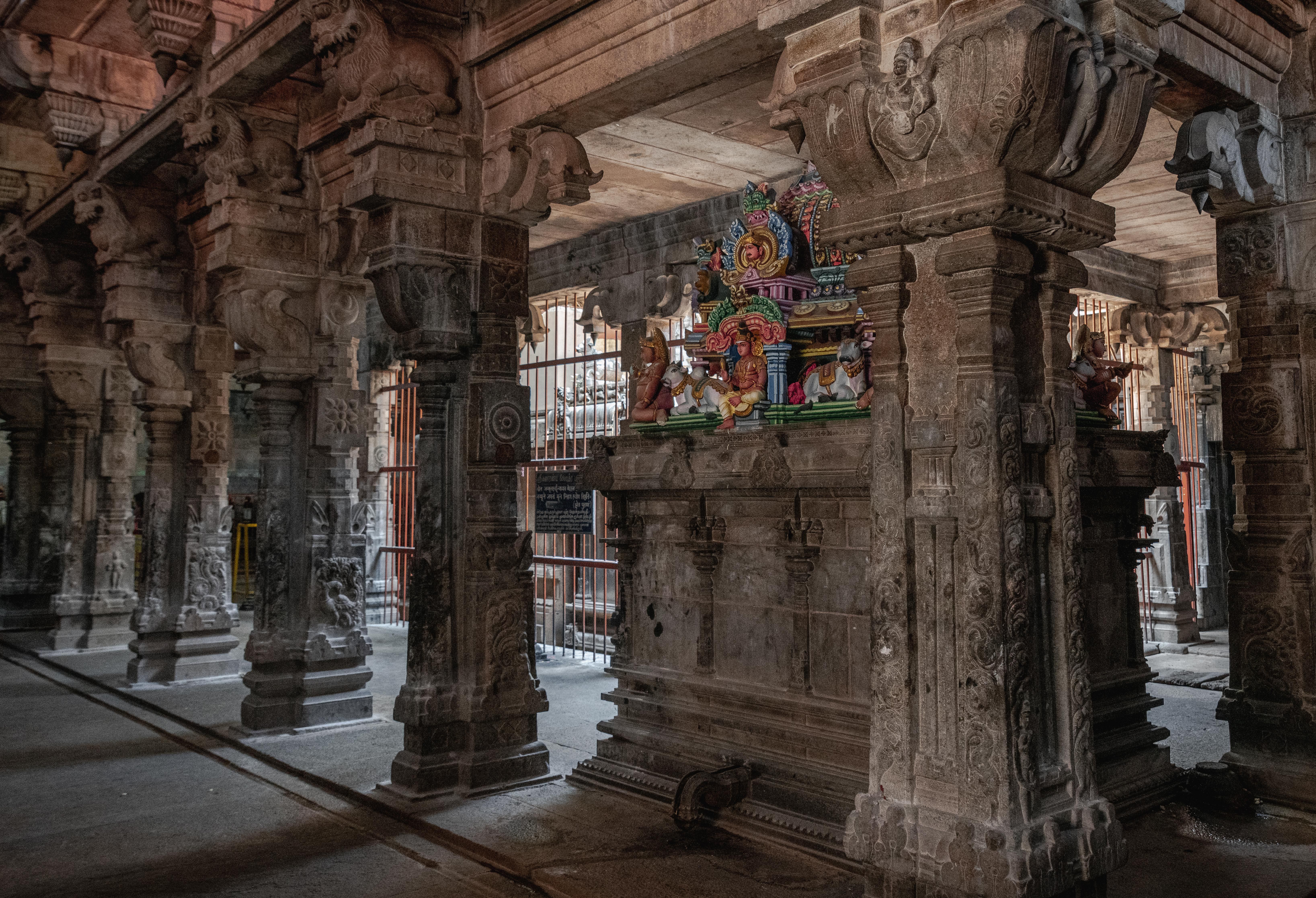 Stone carvings and colorful sculptures in a Hindu temple in Tiruchirappalli, Tamil Nadu, India.