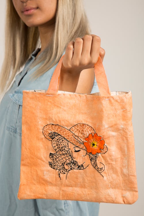 刺繡, 拿著包, 橙子 的 免費圖庫相片