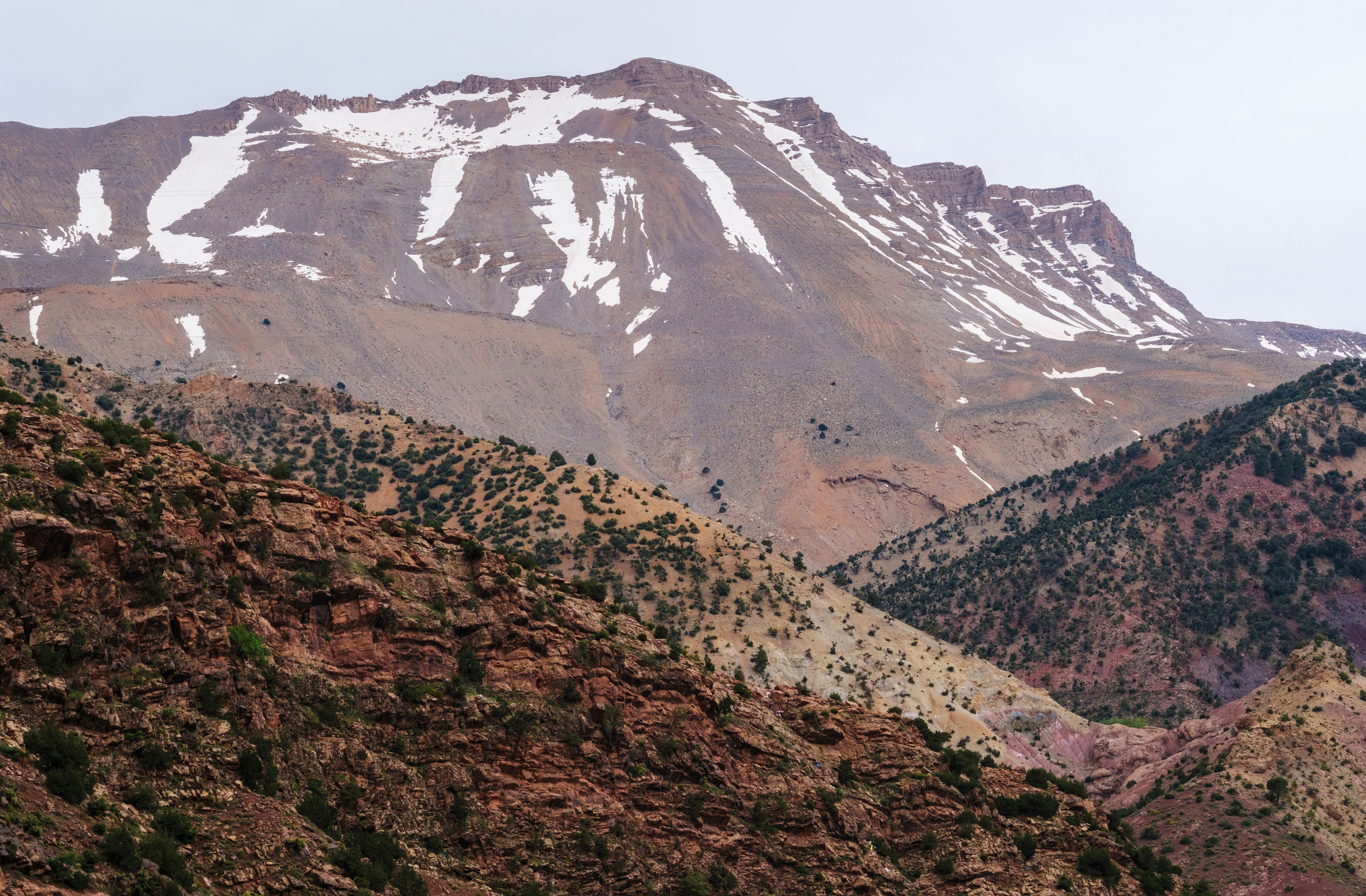Snow-covered peaks and ski slopes in the High Atlas Mountains, Morocco.