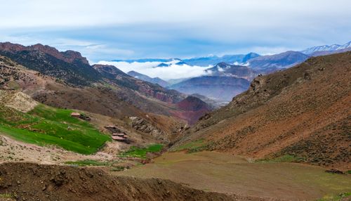 Free Stunning panoramic view of the Atlas Mountains with vibrant valleys. Stock Photo