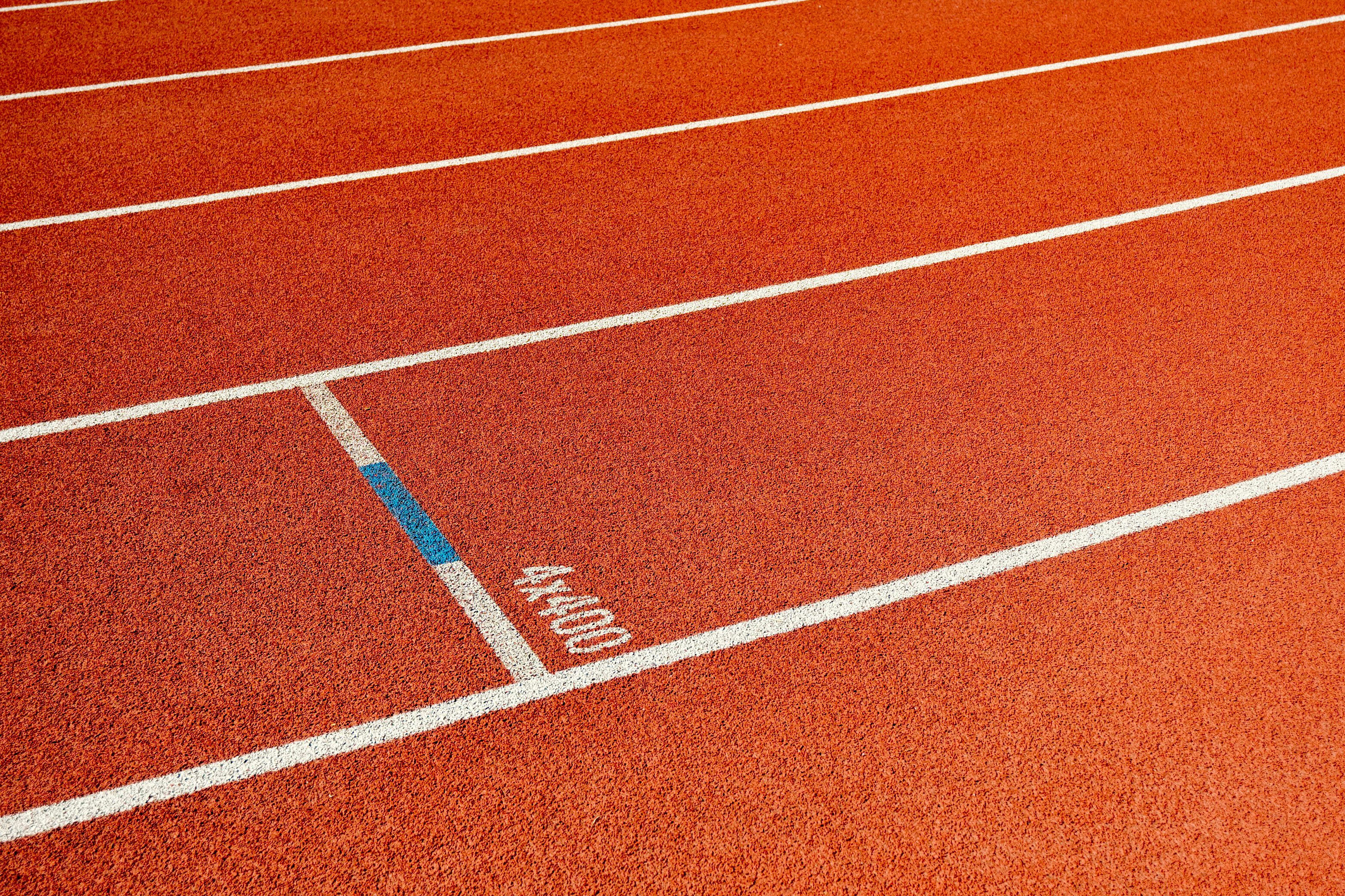 Close-Up of Outdoor Running Track Lanes · Free Stock Photo