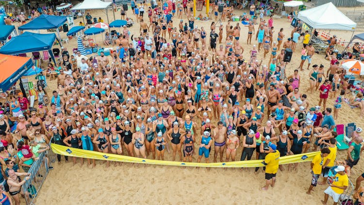 Swimmers On Beach Preparing For Competition