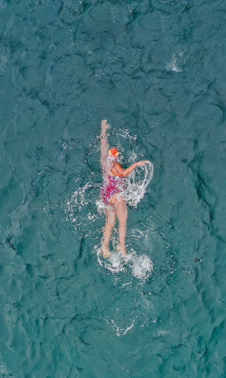 Woman Swimming Professionally In Sea Water