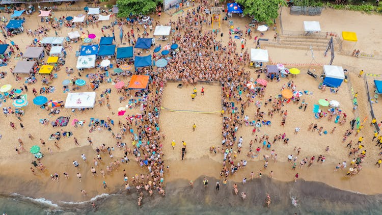 Crowd Of People Gathering On Beach Event