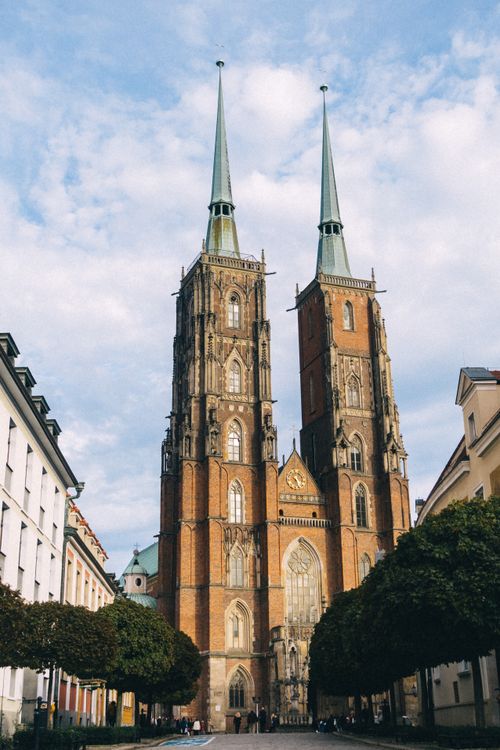 Free Stunning view of the Cathedral of St. John the Baptist in Wrocław, Poland with a clear sky backdrop. Stock Photo