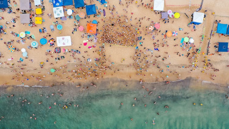 Crowded Sandy Beach On Summer Vacation