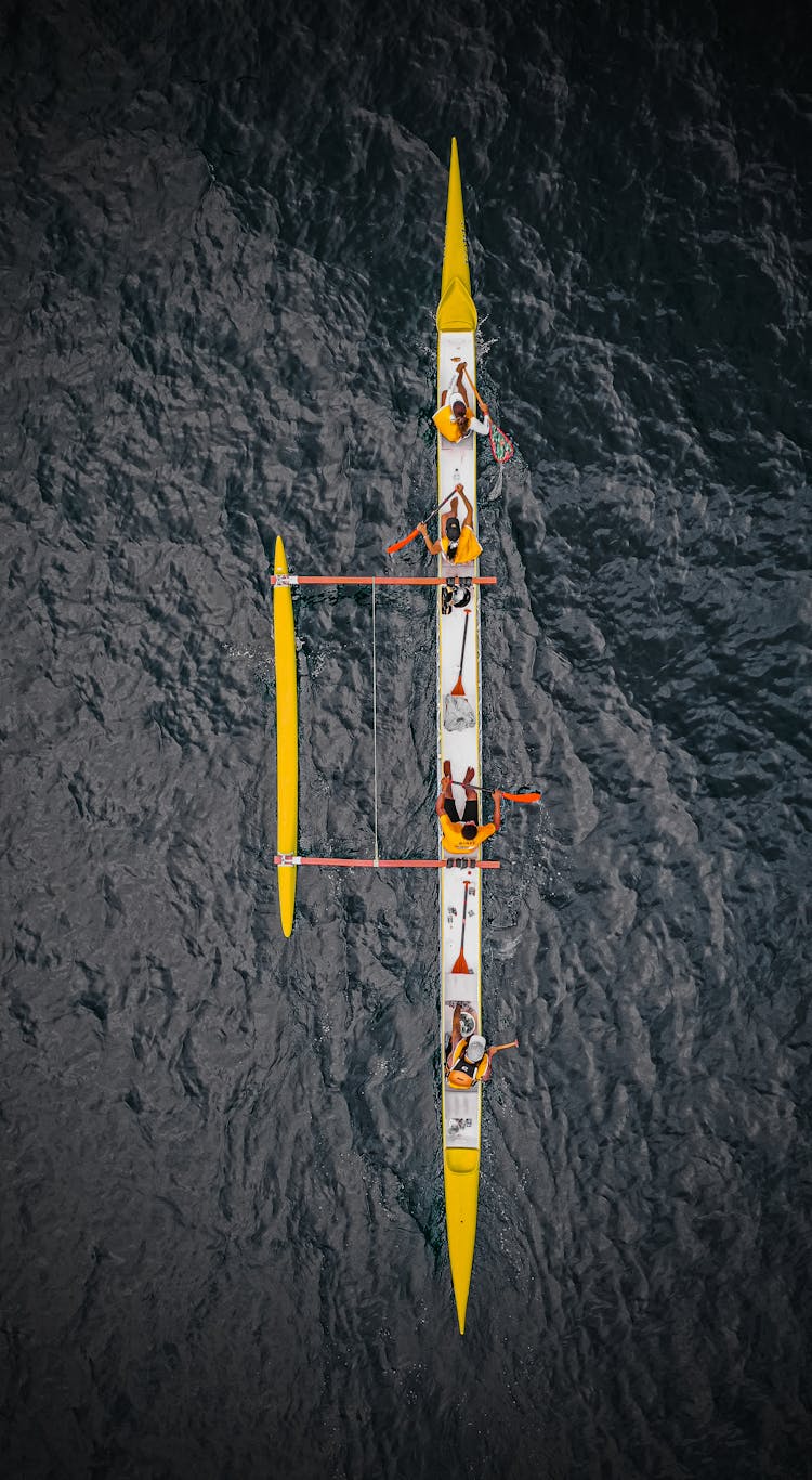 Racing Canoe With Rowers In Ocean