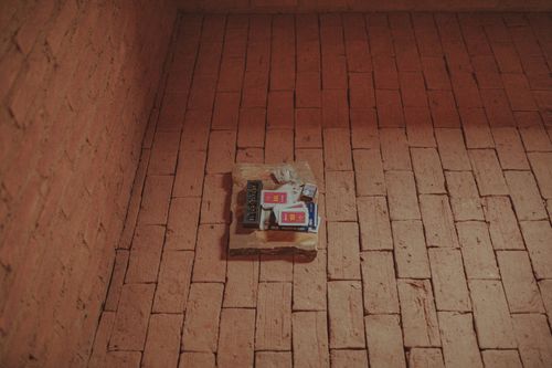 Free From above of domino and card decks placed together with matches on brick aged pavement Stock Photo