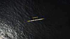 Aerial Photography of Small Vessel On Sea
