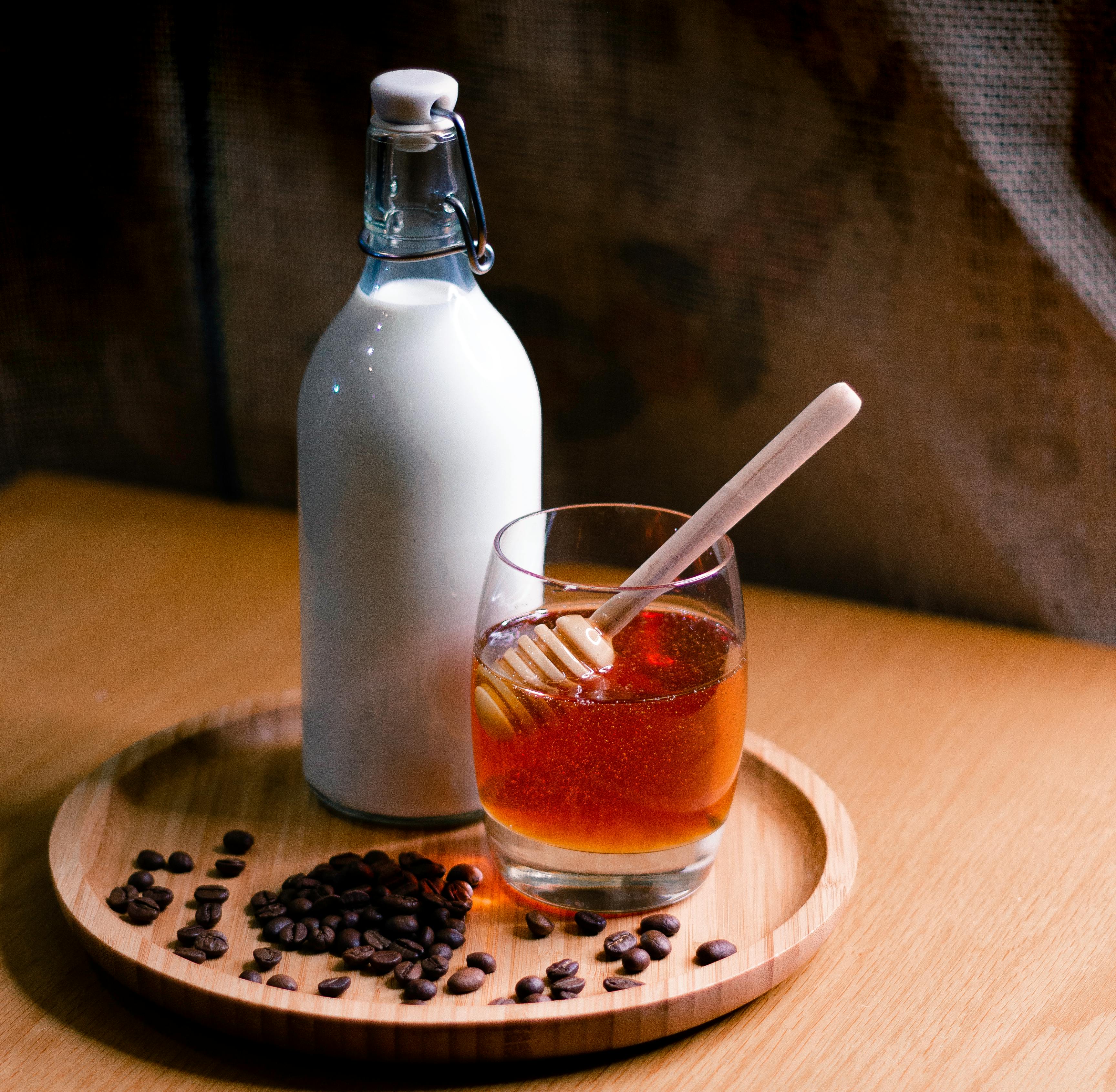 Milk And Honey On Wooden Tray · Free Stock Photo