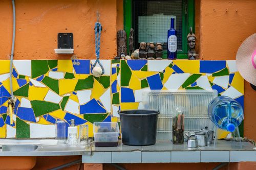 Free Vibrant outdoor setup features mosaic tiles and eclectic decorations in Las Palmas. Stock Photo