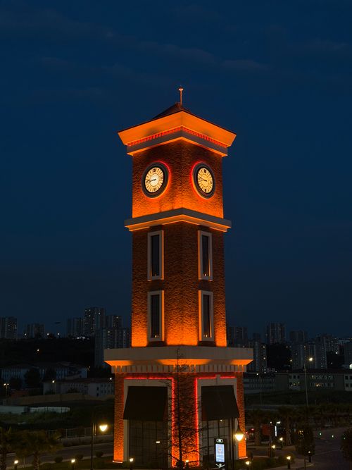 Free Dynamic view of a brightly lit clock tower in Istanbul against the night sky. Stock Photo