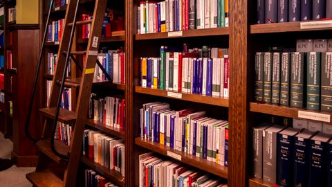 Bookshelves with a ladder in a Polish library, Wrocław.