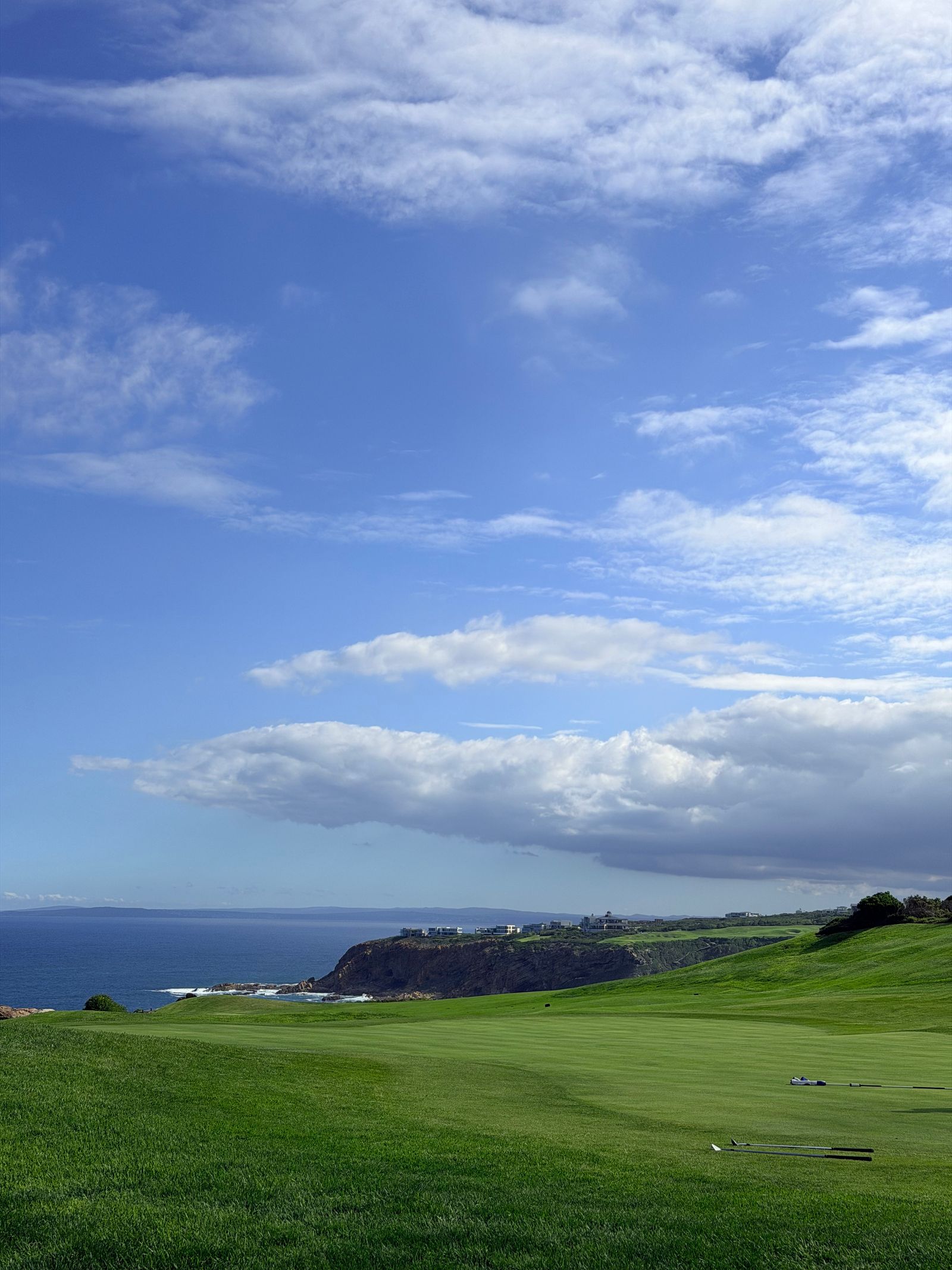 Golf course with an ocean view