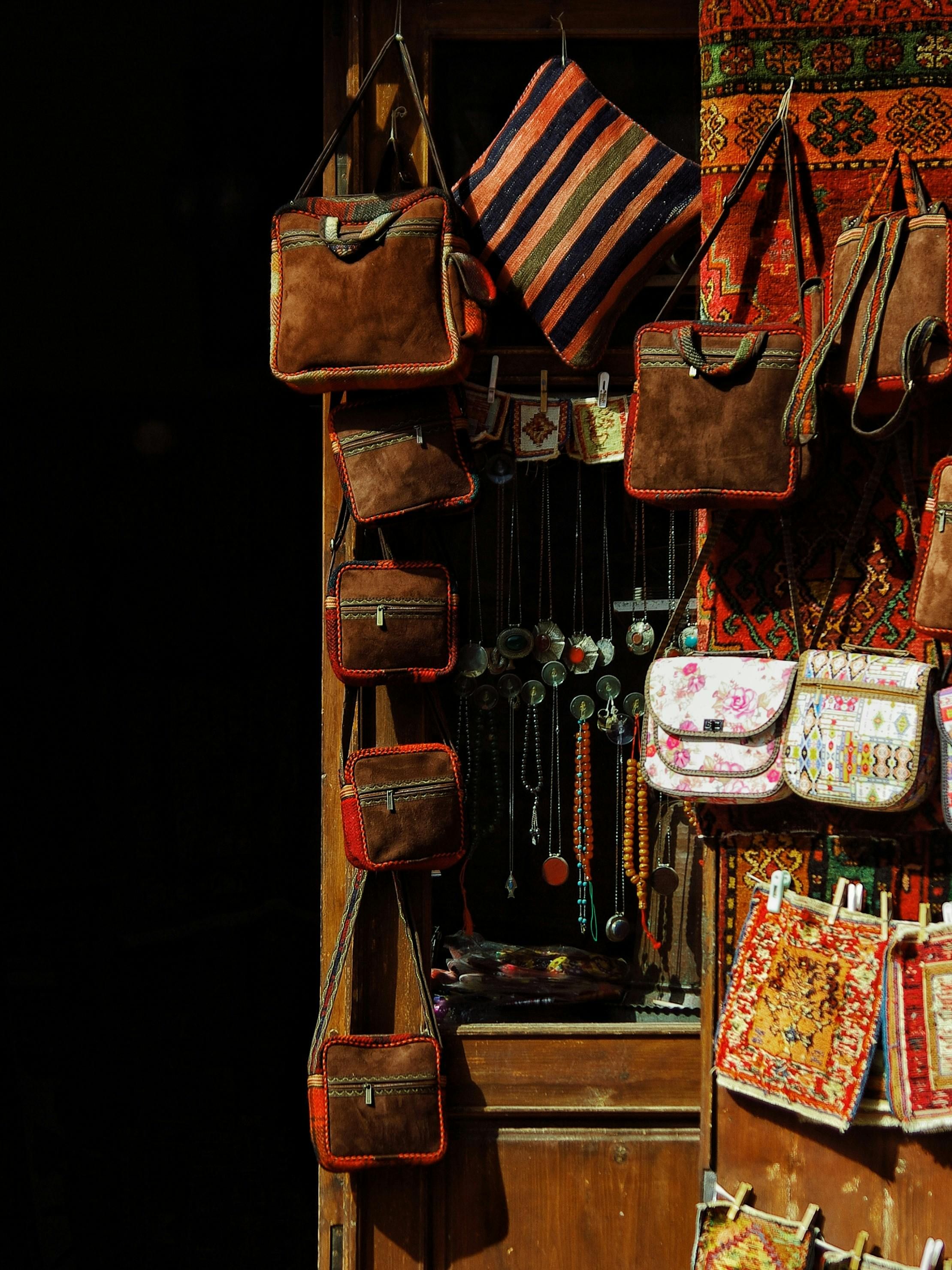 Artisan shop showcasing handcrafted bags and accessories in vibrant colors. - How to Differentiate Between Genuine and Counterfeit Handbags