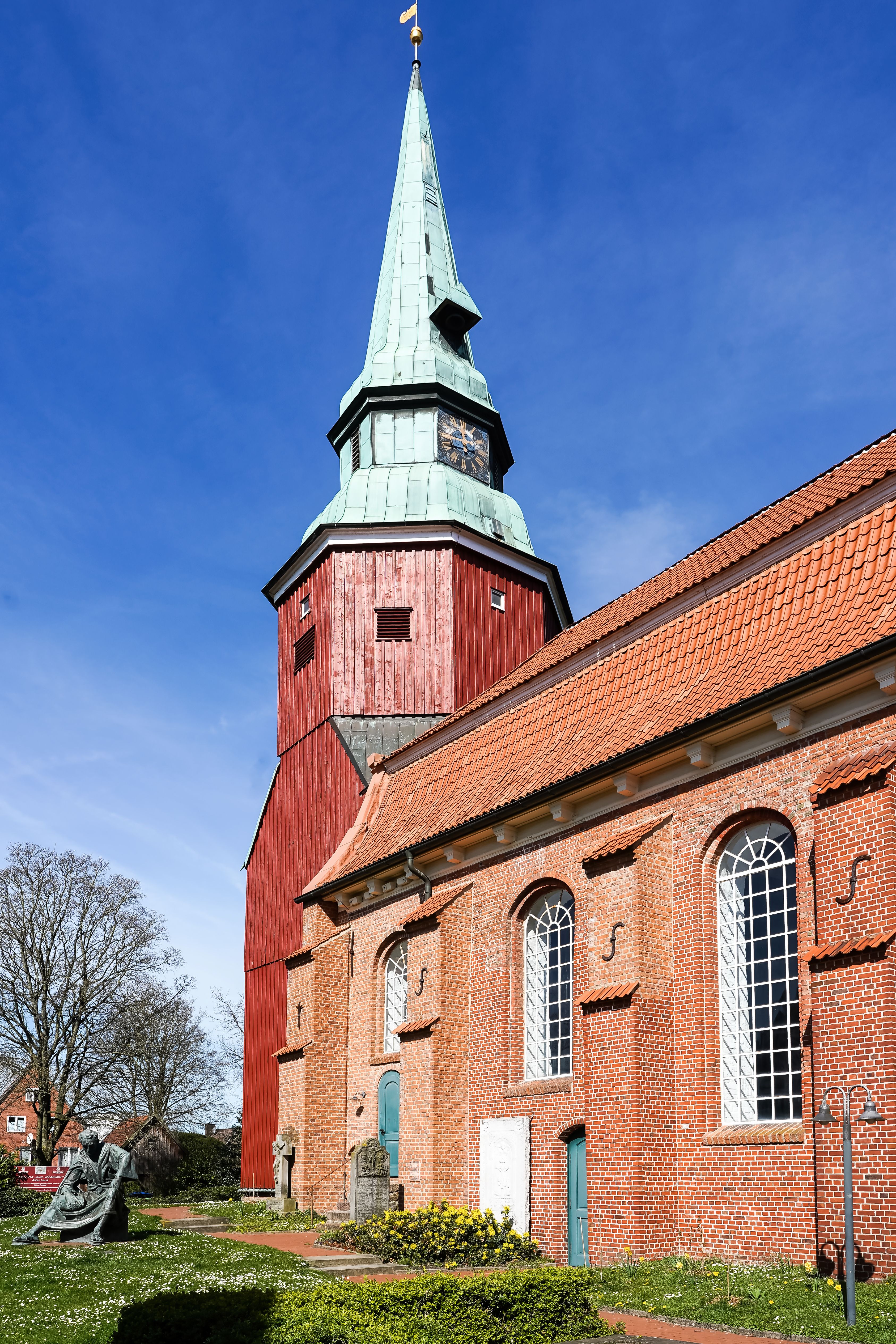 Explore the architectural beauty of a historic church in Steinkirchen, Germany, captured on a perfect day.