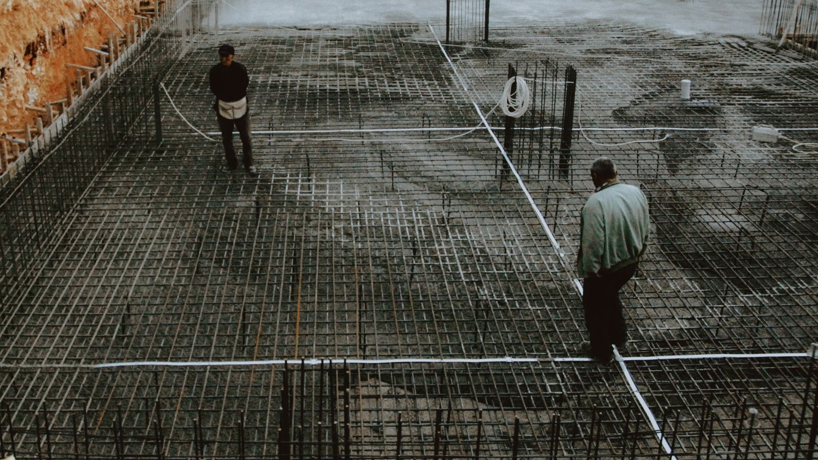 Steel reinforcement grid tied and set out across a slab area before the concrete pour