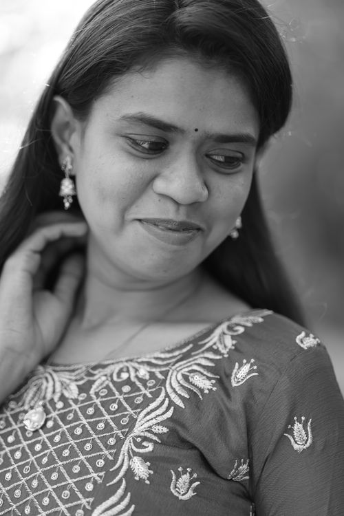 Portrait of a Young Woman in Traditional Attire · Free Stock Photo