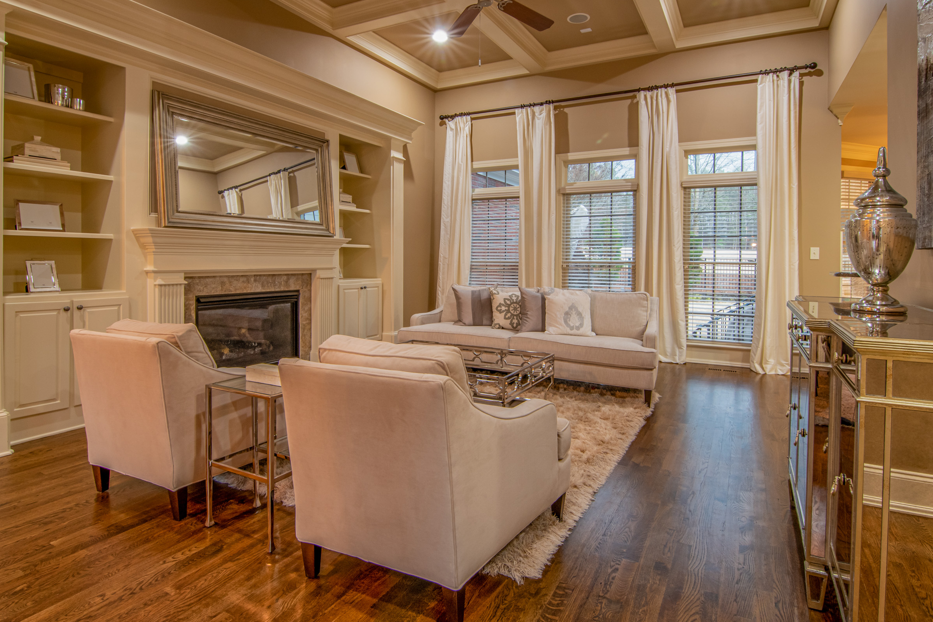 Contemporary living room featuring cozy furniture and a stylish fireplace.