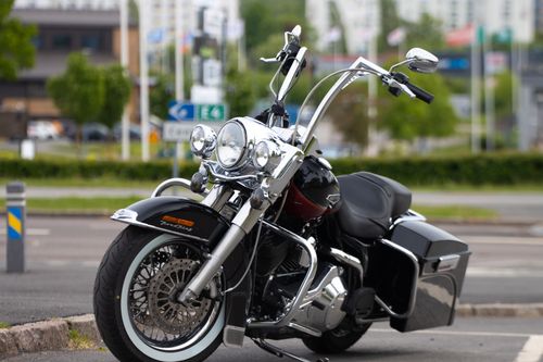 Free A sleek black motorcycle parked in Jönköping, Sweden, showcasing classic design elements. Stock Photo