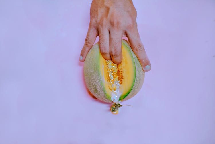 Fingers On Melon