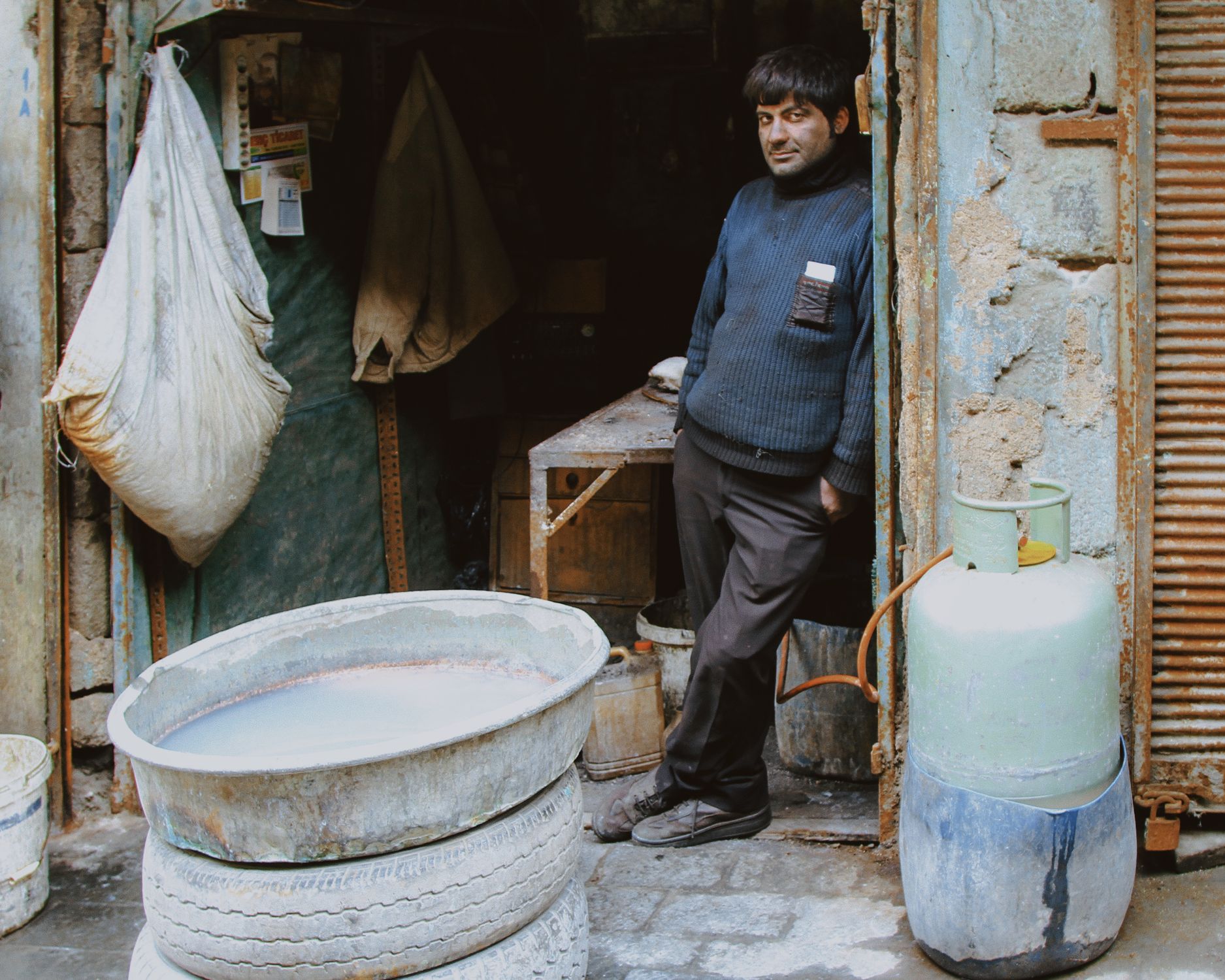 Rustic Workers Man Standing Outside Rustic Workshop · Free Stock Photo