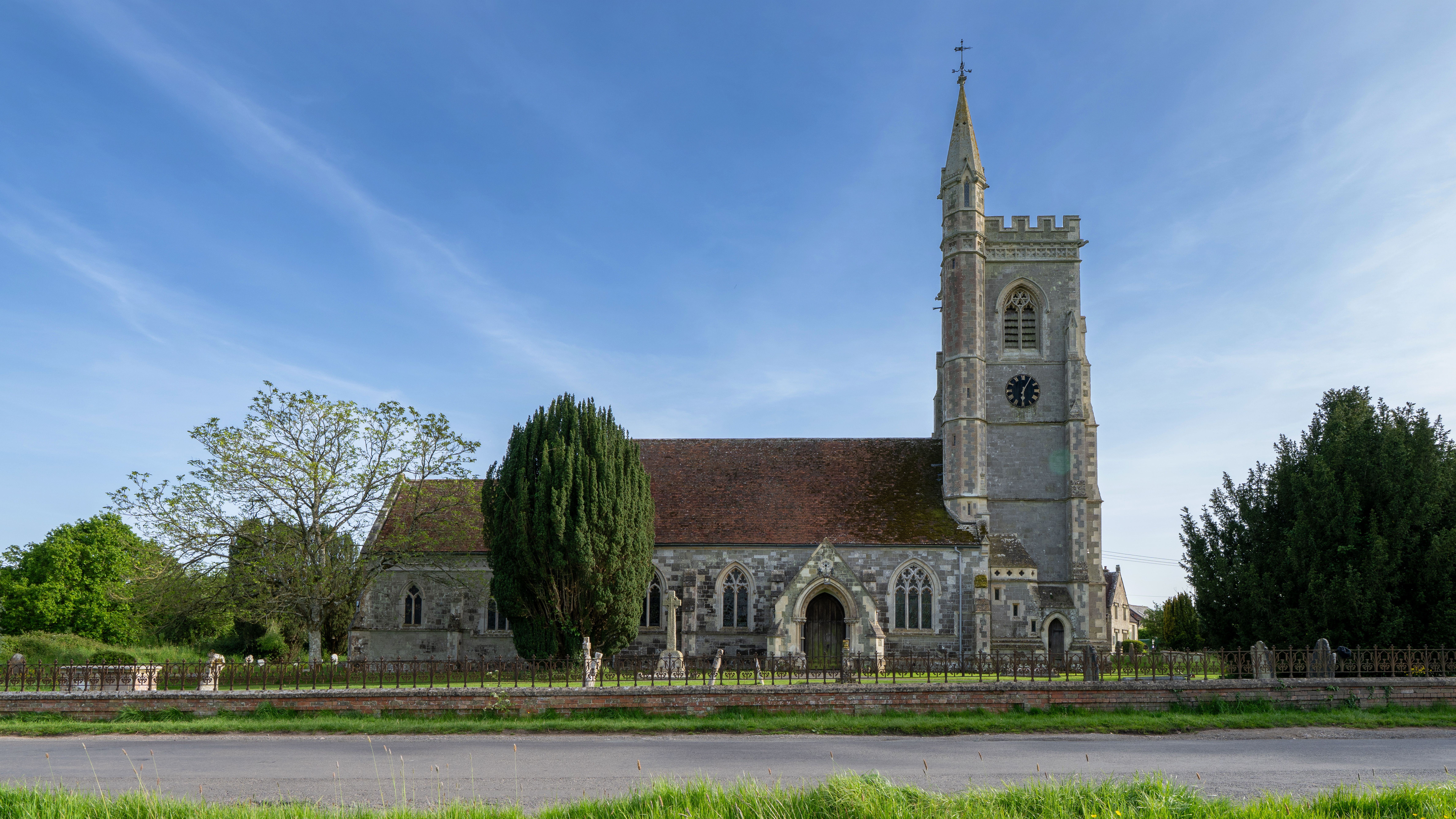 Beautiful view of St. Leonard's Church in Semley, England on a clear sunny day.