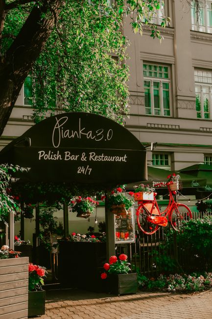 Cozy outdoor view of Pianka 3.0, a Polish bar and restaurant in Warsaw.