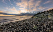 Photo of Rocky Shore During Sunset