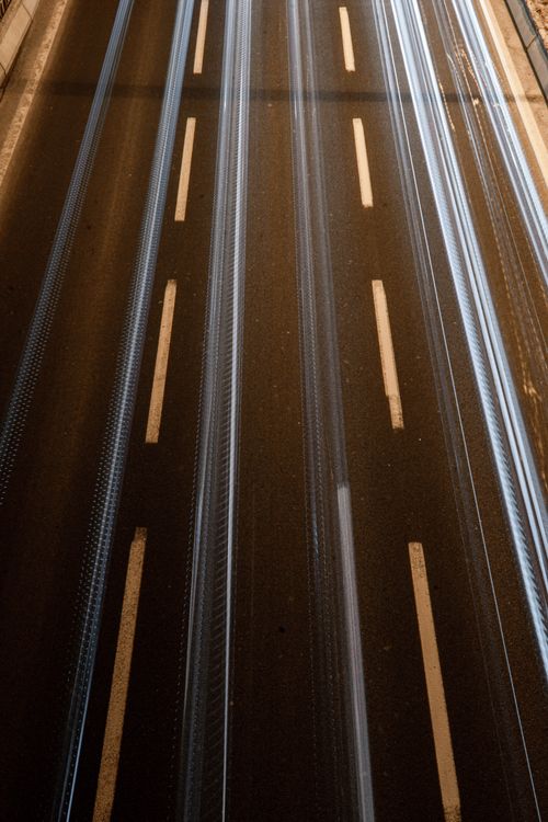 Free Dynamic long exposure shot capturing light trails on a highway at night in Ankara, Türkiye. Stock Photo