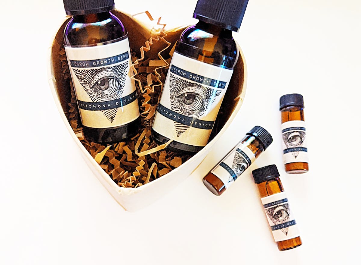 Colorful concert stage with bright lights and silhouettes of performers resembling a K-pop performance