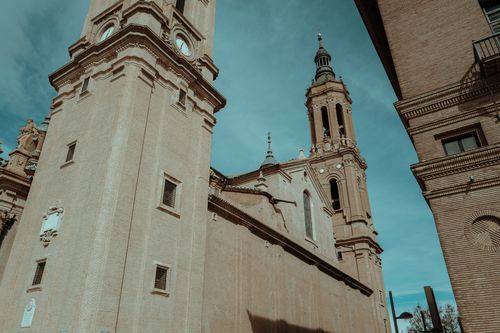 Free Historic architectural details captured at the Basilica of Our Lady of the Pillar on a clear day. Stock Photo