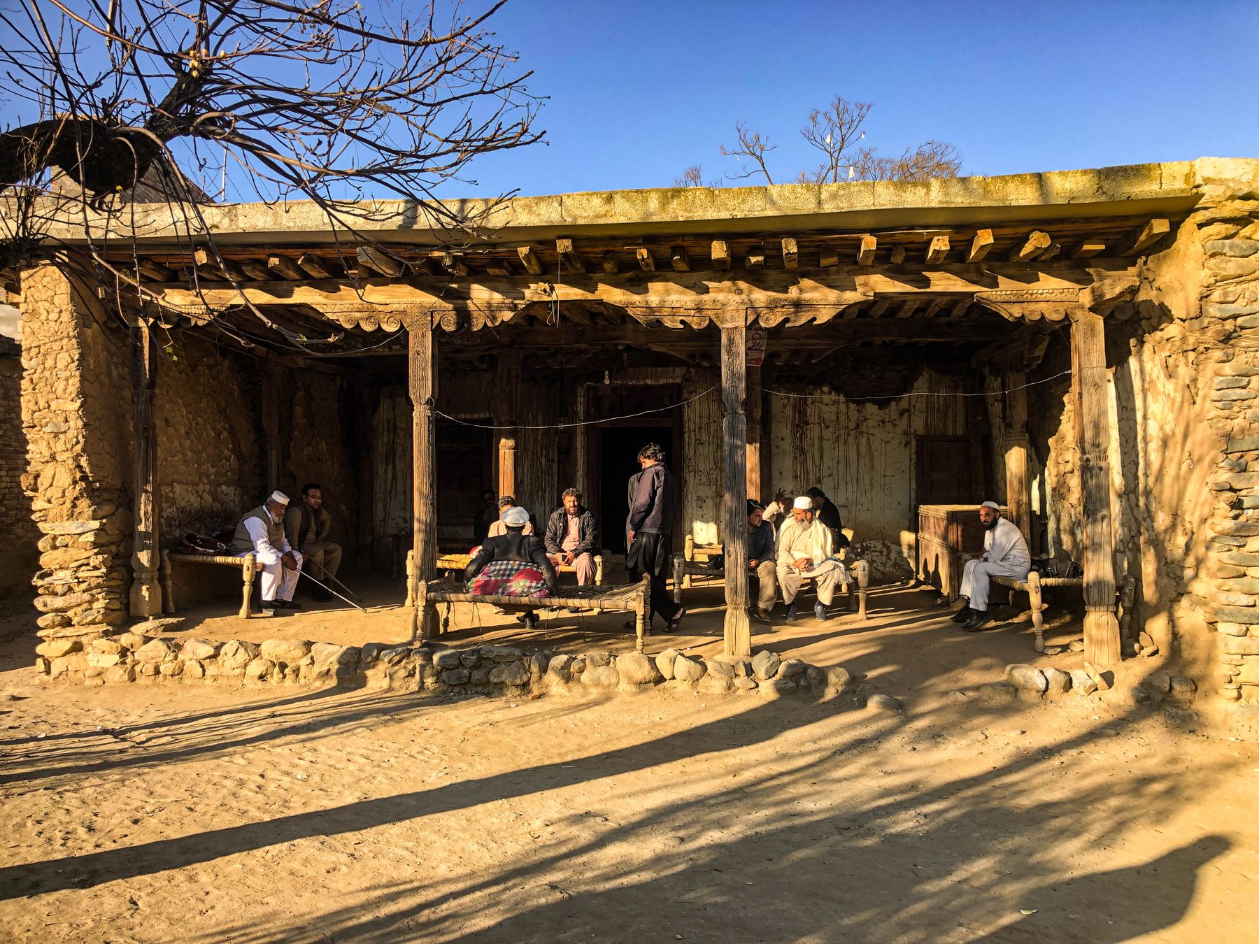 A traditional hujra gathering of village elders in Chamtalai, Khyber Pakhtunkhwa, Pakistan.
