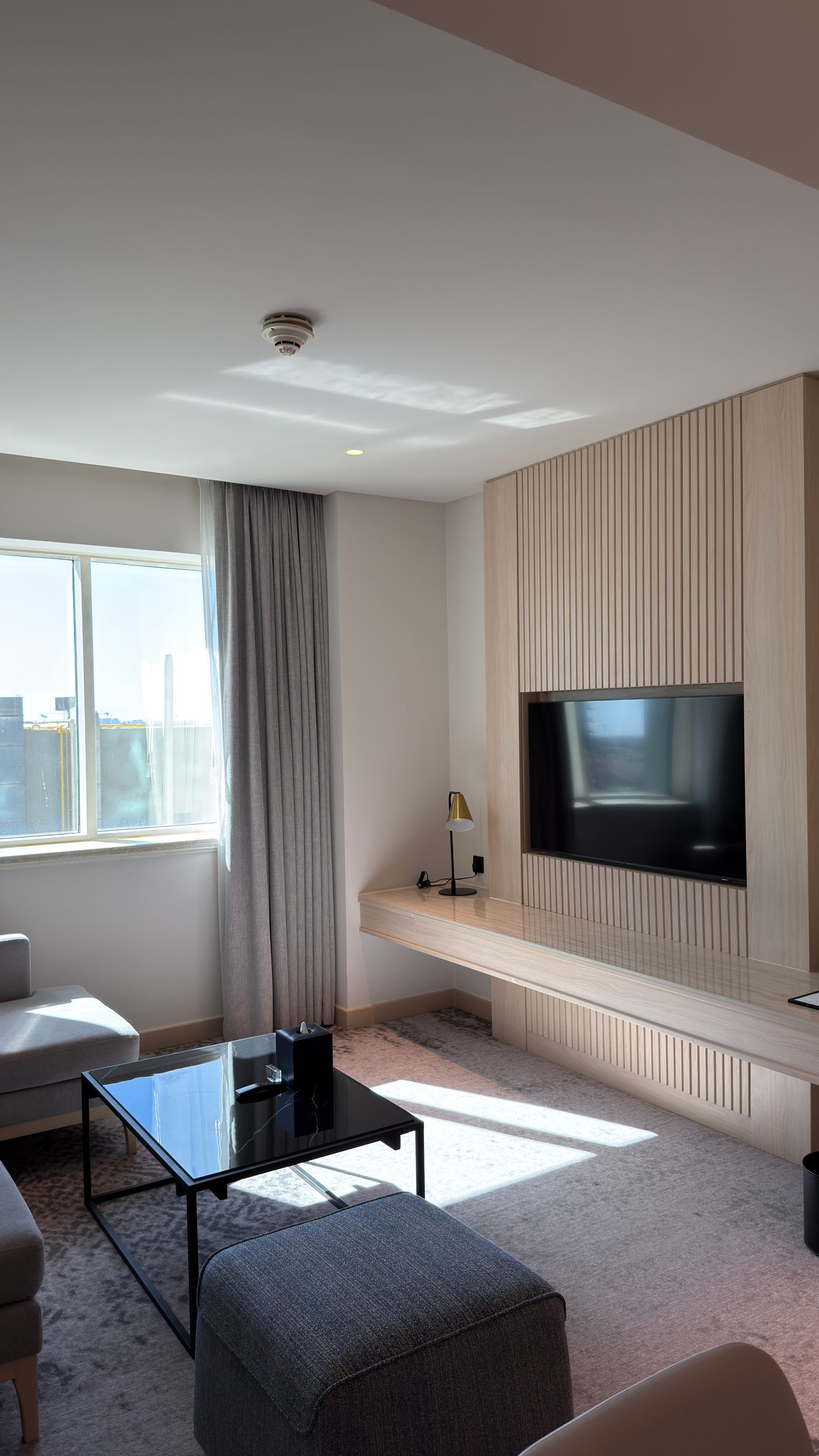 Bright living room with a sleek television setup