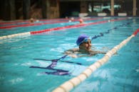 A Woman In the Middle of The Swimming Pool