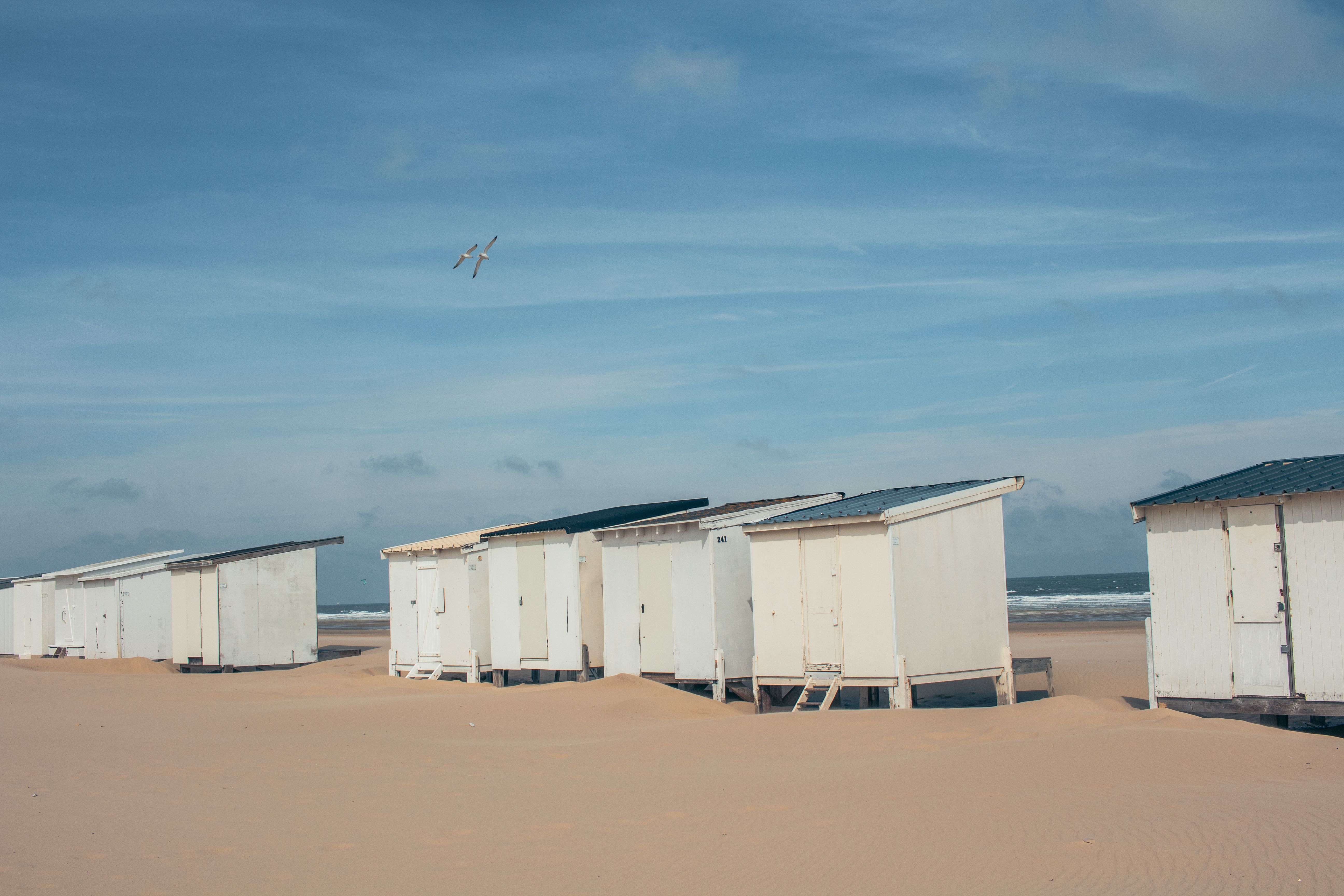 White Beach Huts on Sandy French Coastline · Free Stock Photo